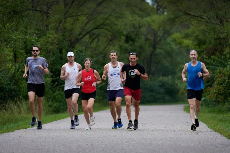 The warming climate is forcing marathons to consider changes to keep runners cool